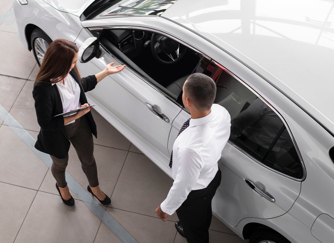 woman selling a car