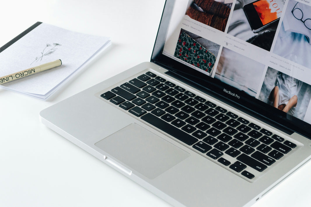 Website displayed on open laptop