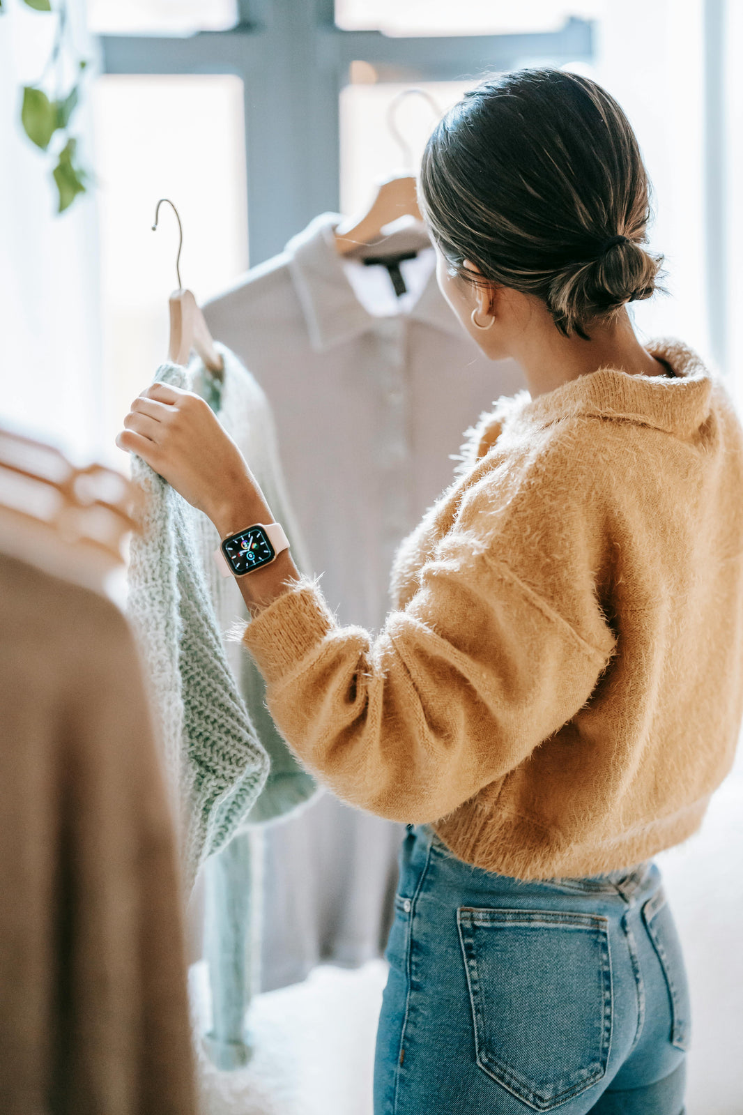 woman browsing clothing store