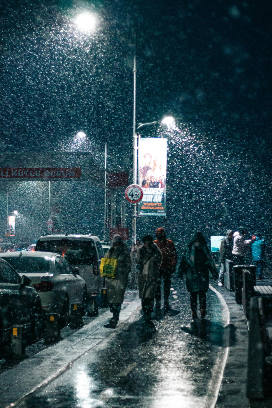 group of people walking in the snow