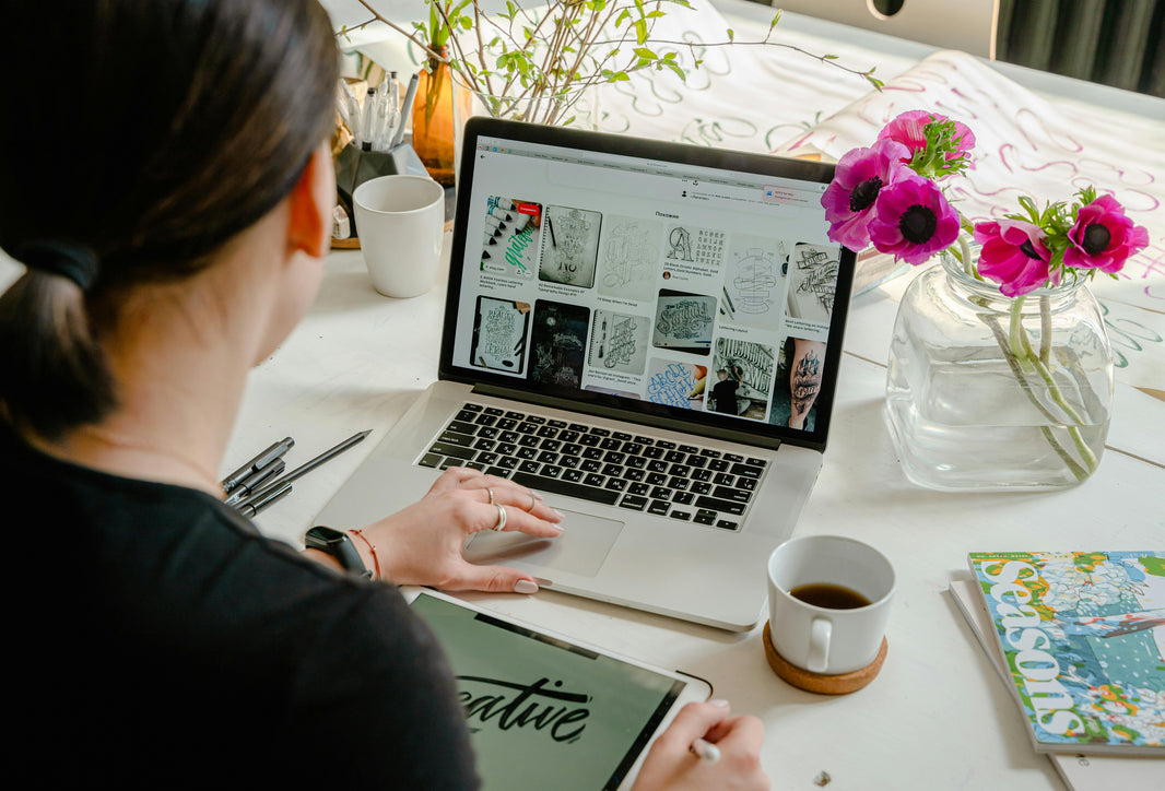 woman looking at laptop