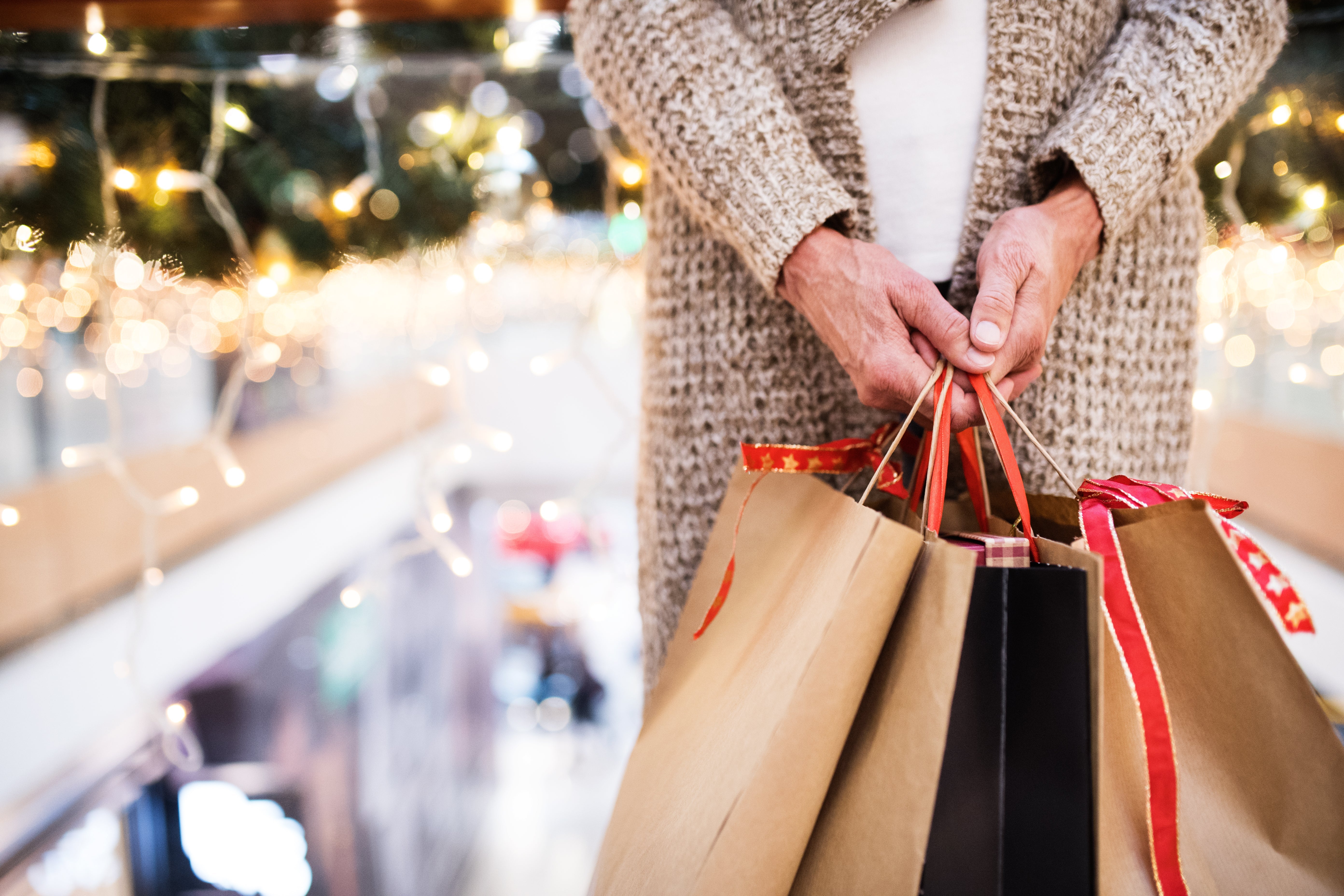 woman holding shopping bags