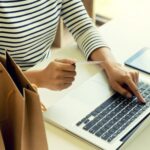 woman holding credit card