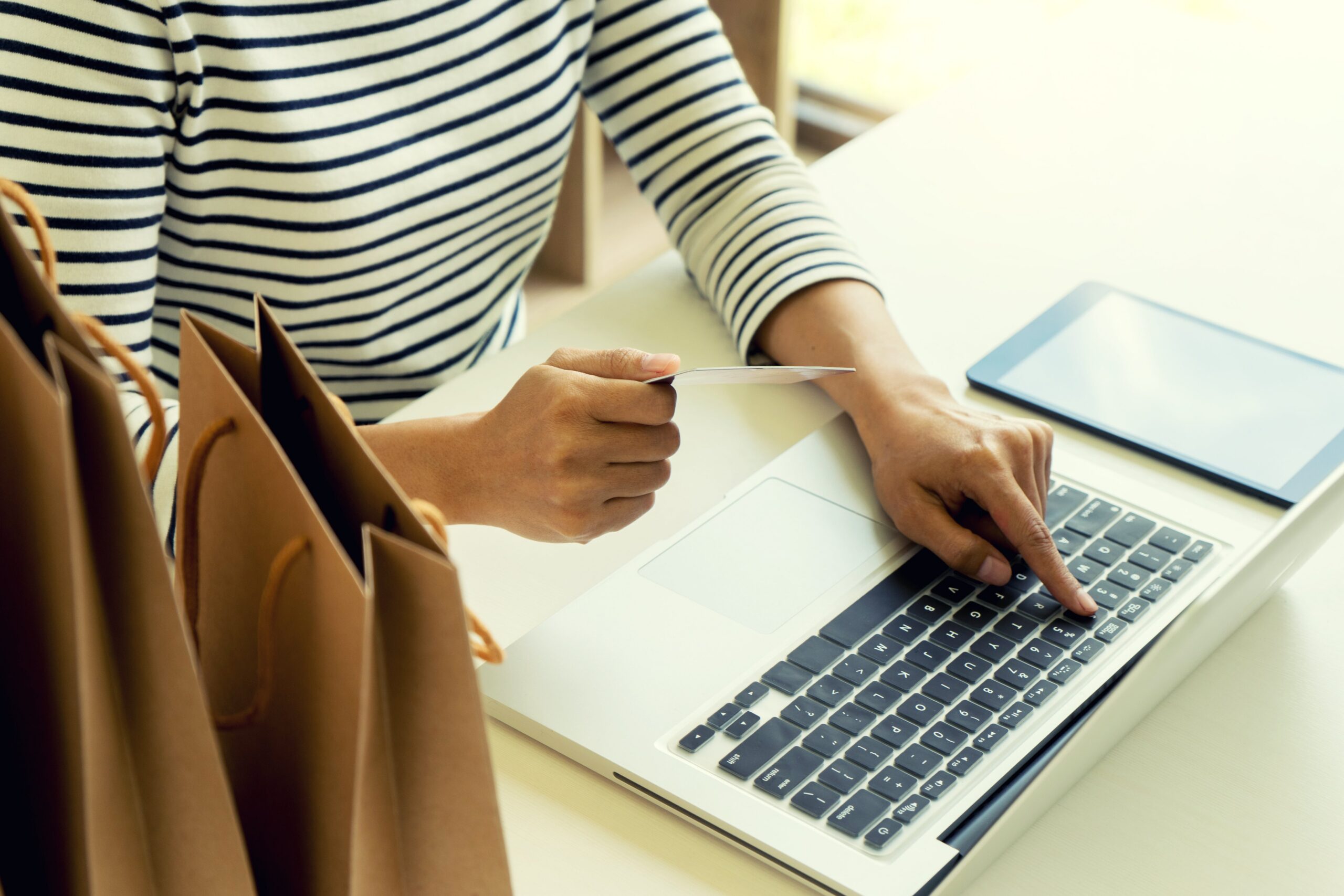 woman holding credit card