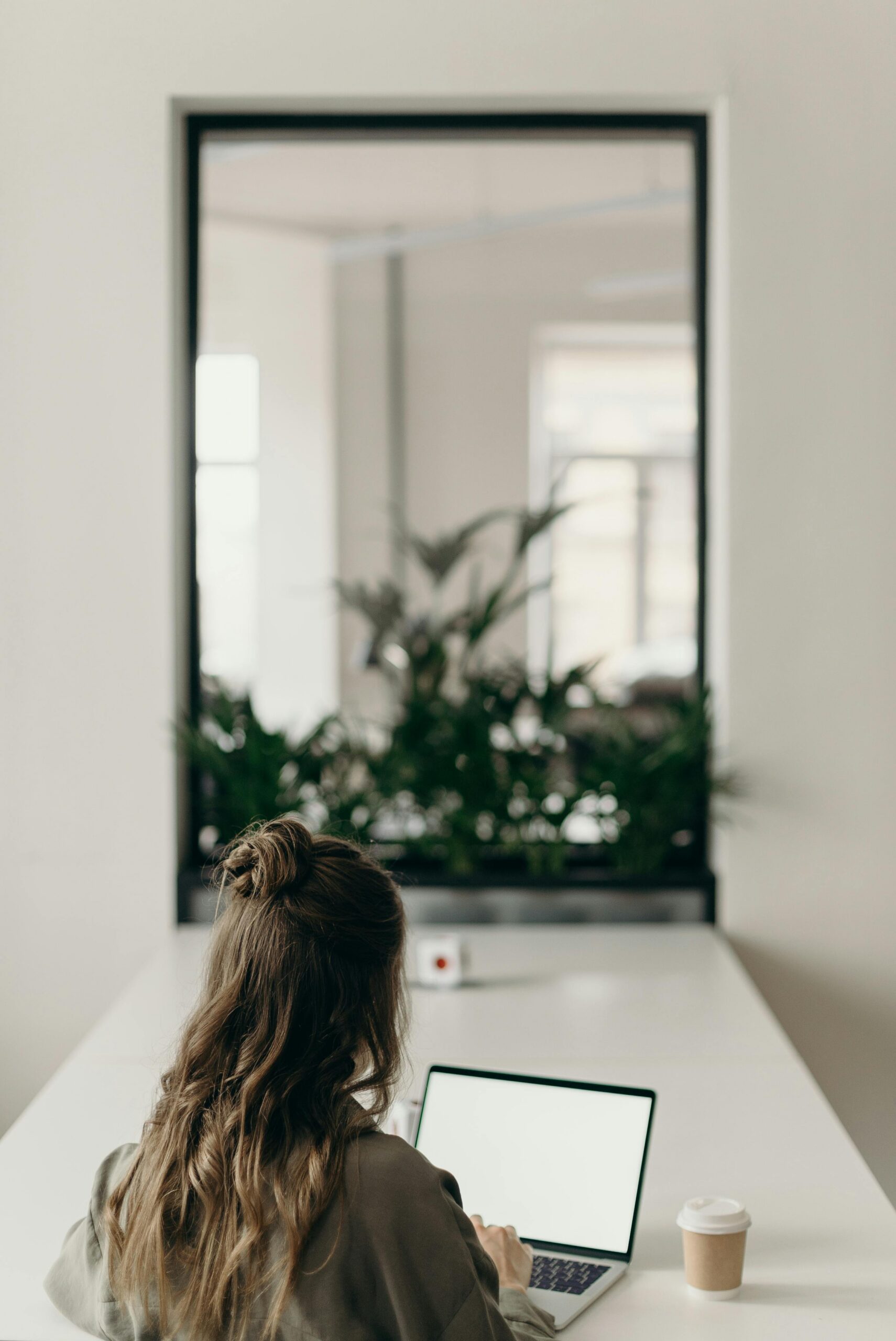 woman looking at laptop