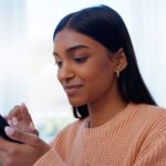 Woman checking email on phone