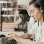 woman typing on computer