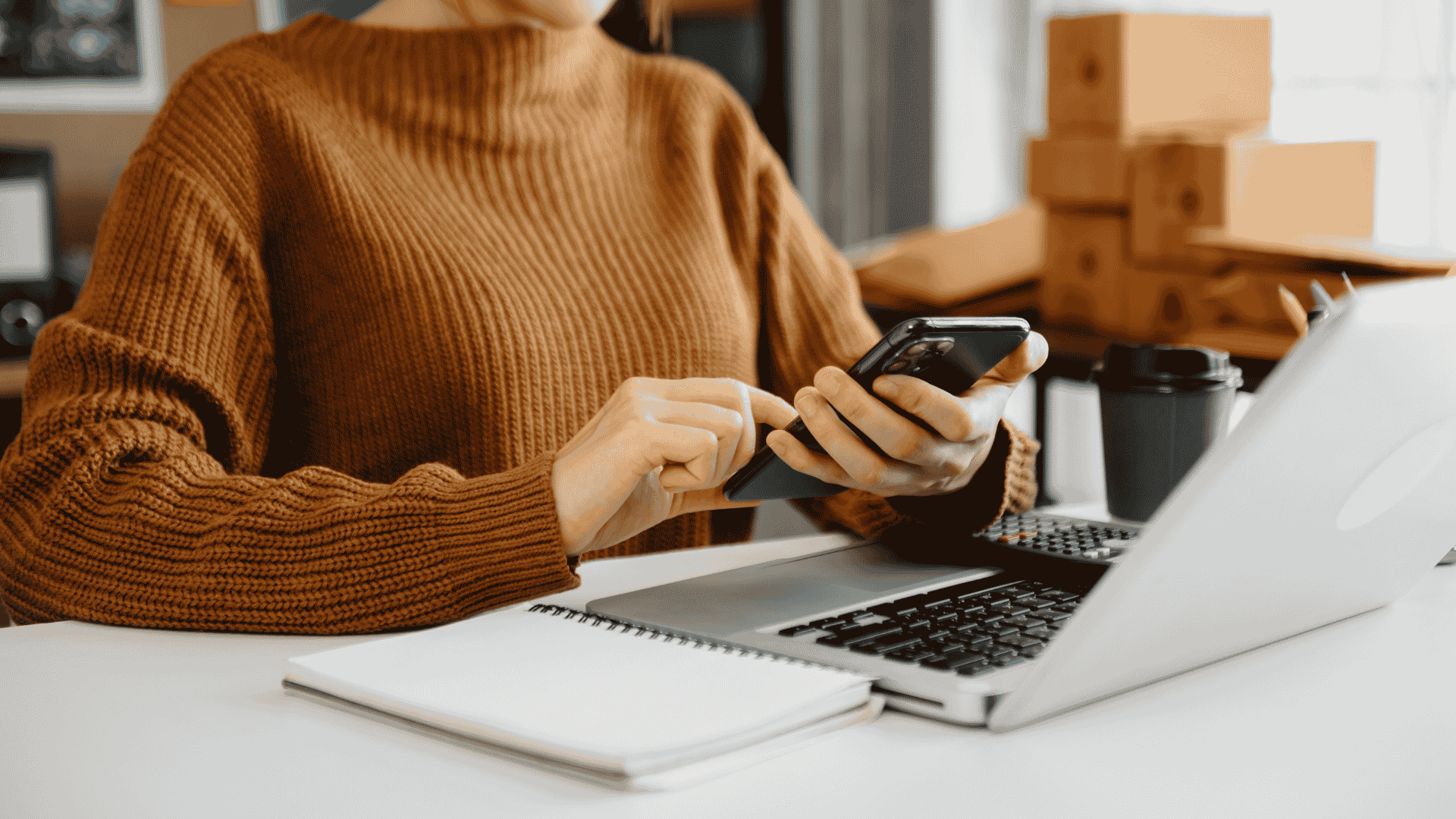 woman typing on cellphone