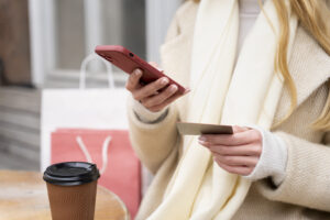 woman shopping on mobile phone