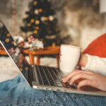 woman typing on laptop