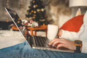woman typing on laptop