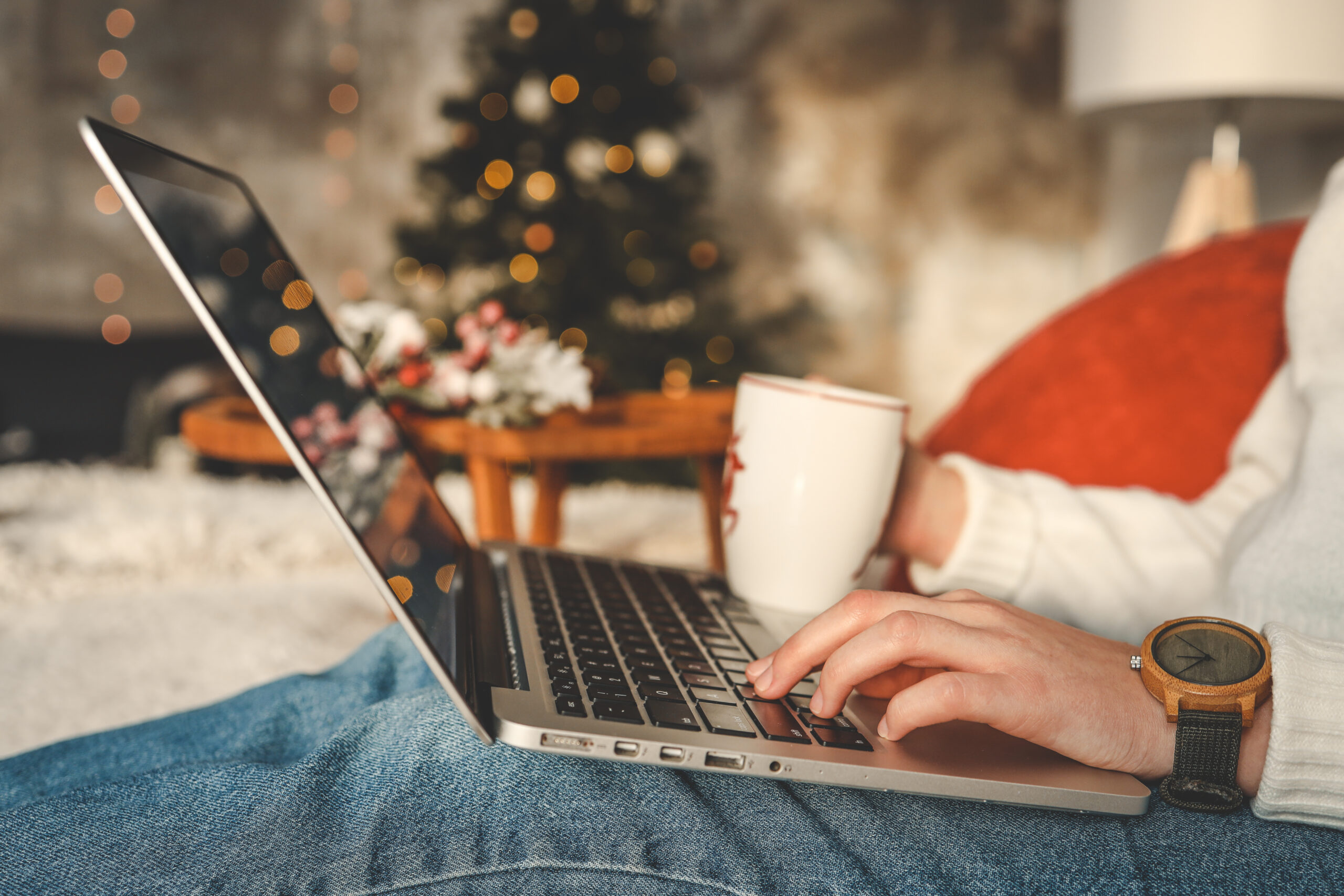 woman typing on laptop