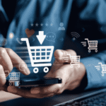 Hand typing on phone with eCommerce icons